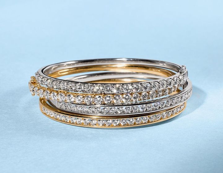 Gold bangle bracelets with lab grown diamonds